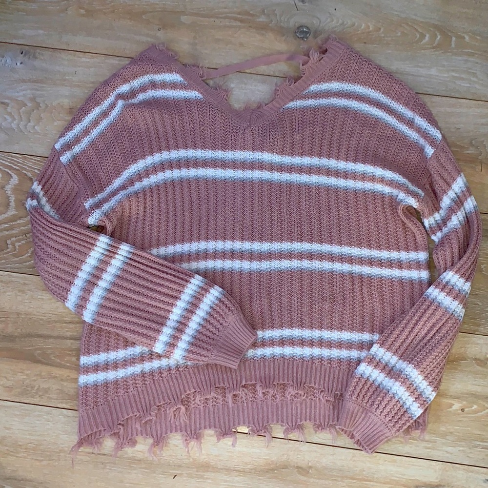 Distressed striped sweater